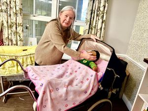 Dovedale Court Care Home’s resident Jill Payne at baby’s nursery station 