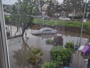 Supporting image for story: Father calls for action as flash flooding submerges his Wolverhampton home and leaves cars and gardens underwater


