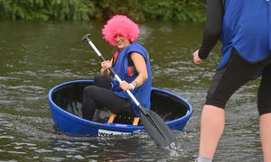 This coracle racer is in the pink