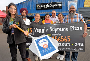 Veggie Supreme Pizza in Wolverhampton. Pictured left, Kerry Nijjar,Harminder Singh,Bethany Lim, Gurjeet Kaur,Pramjit Singh,QAnup Kaur and Jagjit Singh