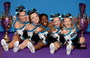 Cheerleaders Sophie Deeley, Ellie Farmer, Shoni Yvette, Katie Pugh and Missy Holder, from Sharon Ann Academy of Cheer and Dance celebrate being selected for Team England. Pic: Tim Thursfield.