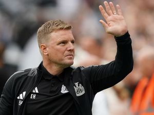 Newcastle manager Eddie Howe waves to the crowd ahead of the Premier League match at St James’ Park, Newcastle