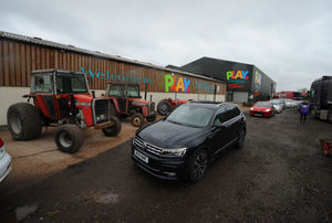 Cars travel through Lower Drayton Farm to order at the new drive-through burger bar