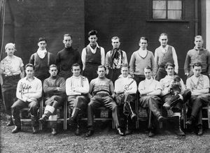 John Shanks is bottom row, third from right, in this photo which may have been taken while he was a prisoner at Stalag VIIIb, although that is not confirmed
