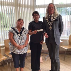 Laura from the town’s Community Fridge with Llandrindod Wells Mayor Councillor Steve Deeks-D'Silva and Deputy Mayor Councillor Kim Nicholls