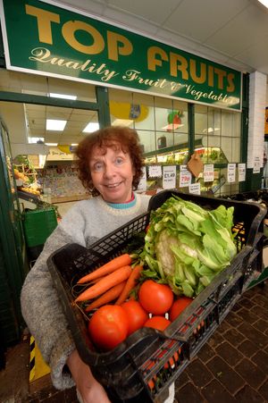 Pictured working at Top Fruits in the market is: Many Perks.