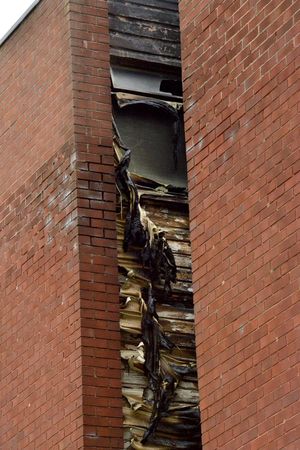 Flames ripped up the right-hand side of building