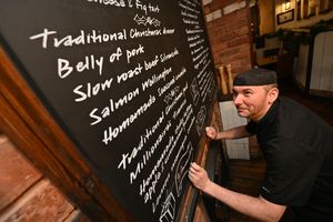 Head Chef Danny Ashfield prepares the specials board