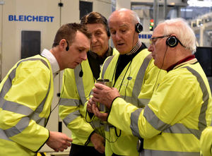 Pensioners from Cannock Chase Probus Club are given a guided tour by staff member Gareth Slater