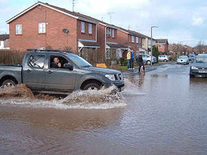 Supporting image for story: Estate roads shut by flood
