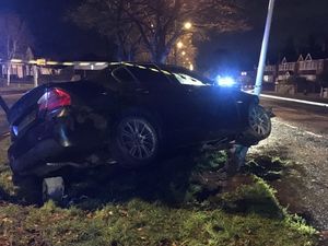 Supporting image for story: Car left wedged into lamppost after suspected drink-fuelled smash