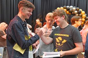 Friends celebrated together after receiving their results at Kingsmead