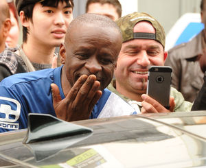 A fan blows Theresa May a kiss outside the E&S's Queen Street offices