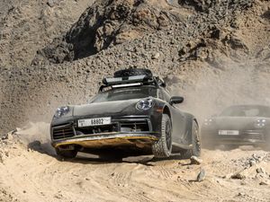 Supporting image for story: Porsche teases new off-road-ready 911 Dakar ahead of reveal next week