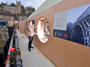 Supporting image for story: Visitors to Iron Bridge have a special walkway to get close to work to preserve the landmark for future generations