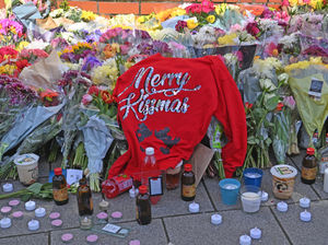 Tributes left at the scene of the fatal stabbing of Isaac Brown in West Bromwich