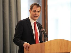 Foreign Office minister Hamish Falconer speaking at “The Women Who Beat ISIS” travelling photo exhibition