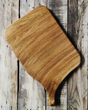 His products range from stylish chopping and charcuterie boards to unique coffee tables and benches