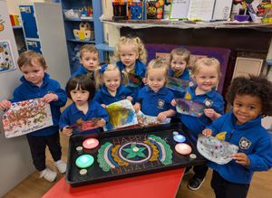 Little Trinity Nursery children delighted with their Diwali celebration creations.