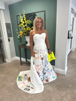 CAPTION: Care home manager Lianne Sturmey said yes to the dress designed by residents at The Oaks in Rubery.