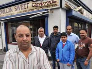 Supporting image for story: Traders' plea for calm as they count cost