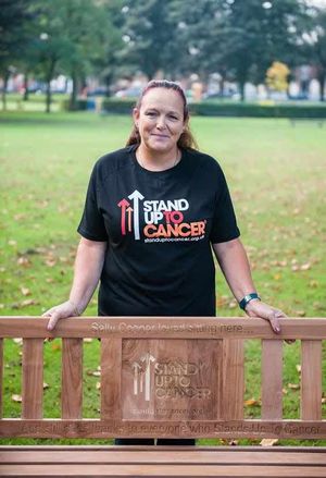 Sally standing at her bench