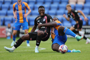 Aaron Pierre fires into a tackle (AMA)