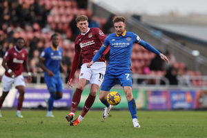 Carl Winchester of Shrewsbury Town and Mitch Pinnock of Northampton Town (AMA)
