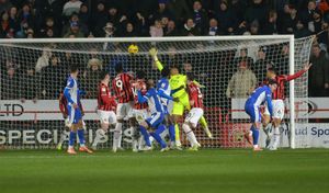Joe Garner heads Oldham into the lead on 15 minutes.