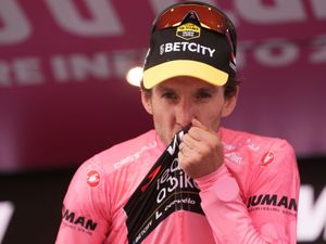 Supporting image for story: Simon Yates finishes safely in peloton to seal victory at Giro d’Italia