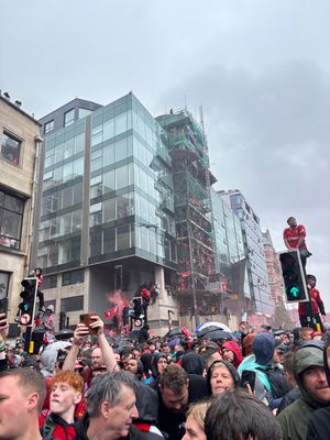 The scene as fans waited for the bus parade. Hundreds, if not more, clambered up scaffolding. Pic: Lewis Cox