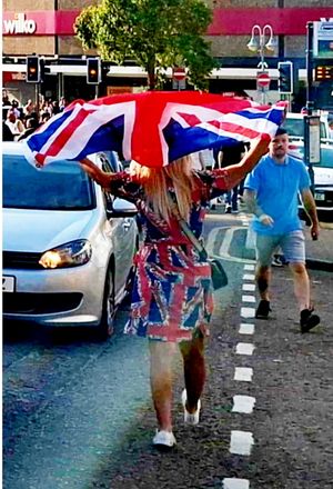 Tanya Ostolski in her patriotic dress.  A woman who was wearing a Union Jack dress and refused entry to a Wetherspoon's pub said she won't be going back - despite being a regular at the pub for nearly 30 years. Tanya Ostolski, 54, tried to enter The Picture House in Sutton-in-Ashfield, Nottinghamshire, where she was turned away due to her outfit, she claims. The events followed an anti-illegal immigration protest that took place in Nottingham town centre on Friday July 25 which Tanya attended.  The protest was sparked after Reform MP Lee Anderson made an unverified claim that a local man charged with rape was an asylum seeker. After marching in the protest, Tanya made her way to the local Wetherspoons establishment but was denied entry due to her dress, despite putting away the flag she was carrying, she says. 