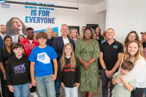 (L-R) Elise Fry, Scott Monks, Merlin, Sharon Thompson, Archie and Jim Simpson at the launch of Birmingham\'s Rocksteady Music School. PIC: West Midlands Growth Company