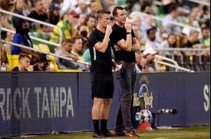 Foley and Collins on the touchline