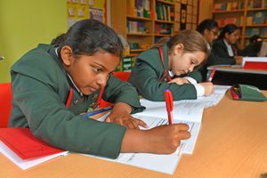 Students are eager to get involved in the school's writing lessons, where they learn penmanship
