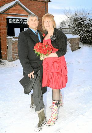Stuart and Helen Williams got married at the chapel in their wellies after battling through snowfall in December 2010