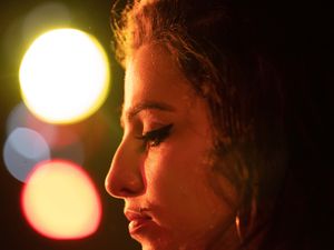 Supporting image for story: Amy Winehouse portrayed looking sombre in new image from biopic