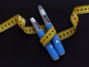 Weight loss injectors and measuring tape
