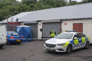 Police at the scene where Carl Woodall was found dead. Photo: SnapperSK