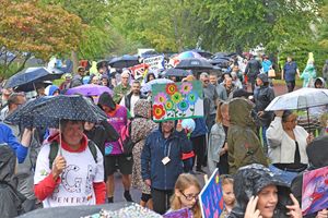 Walkers defy the rainshowers. 