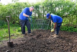 Staff member Andy Skidmore and volunteer Tony Prosser