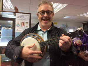 Supporting image for story: Two George Formby ukuleles sold for £23k