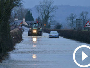 Supporting image for story: Cars trapped as floods hit region