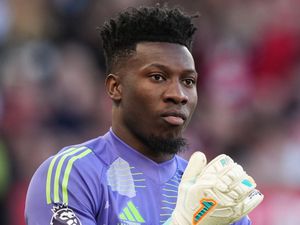Andre Onana looks on