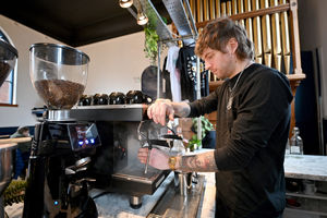 Jake serves a customer