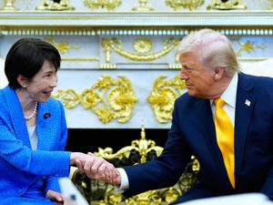 Supporting image for story: Japanese PM tries to reaffirm alliance with Trump