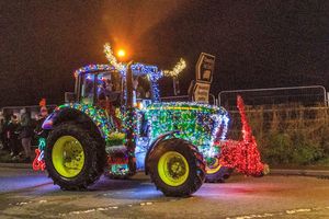 Illuminated tractor sets off from Oswestry Livestock Market