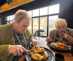 Sally and Janet taste Jake's winning dish