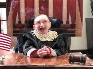 Supporting image for story: This girl incorporated her wheelchair into a fabulous judge outfit for Halloween