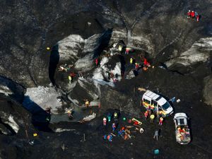 Supporting image for story: Police in Iceland call off search at collapsed ice cave